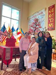 People standing in the Buddha Hall